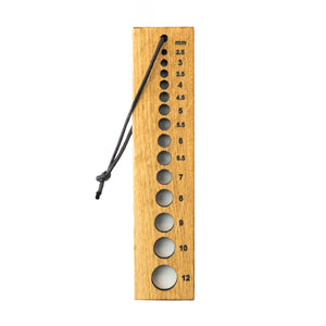 Knitting for Olive needle gauge stick